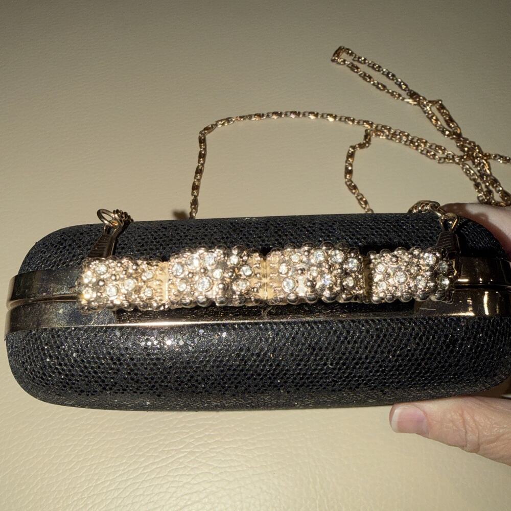 Charming Charlie black glitter knuckle-ring clutch purse detachable chain